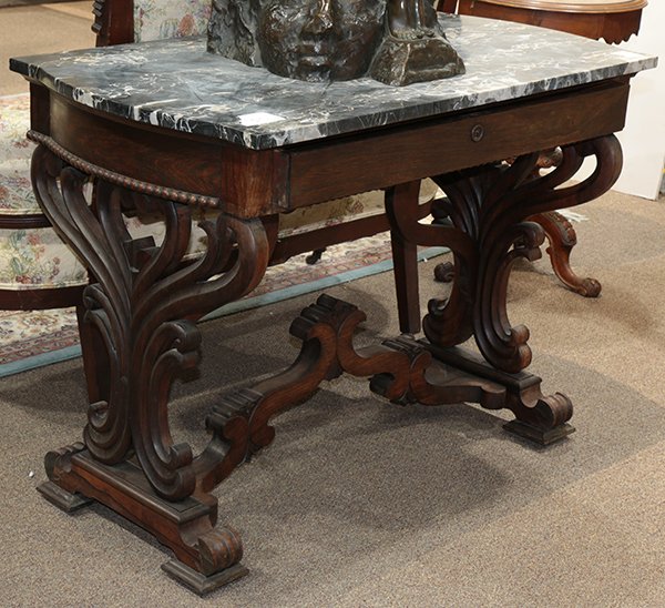 Signed J and J.W Meeks rosewood foyer table: Signed J and J.W Meeks rosewood foyer table, executed in the Rococo taste circa 1860, having a shaped marble top, surmounting single drawer case with scrolled supports, and rising on outswept feet, 31