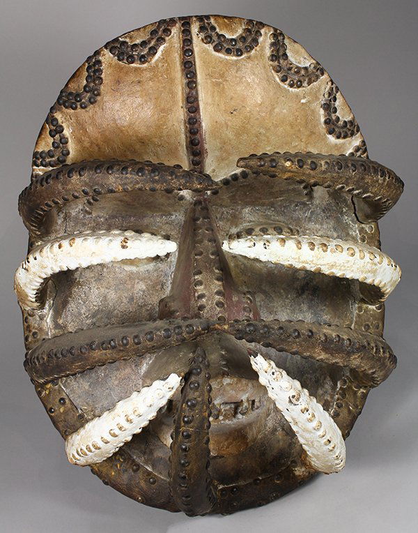 West African carved decorative mask having protruding (1 of 4)