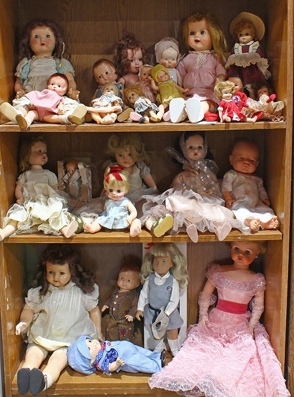 (lot of 24) Three Shelves of dolls, 20th Century,: (lot of 24) Three Shelves of dolls, 20th Century, including composition with some Effanbee examples; assorted vinyl and plastic styles, Bye Baby Bunting retaining the original box, and Sasha dolls, la