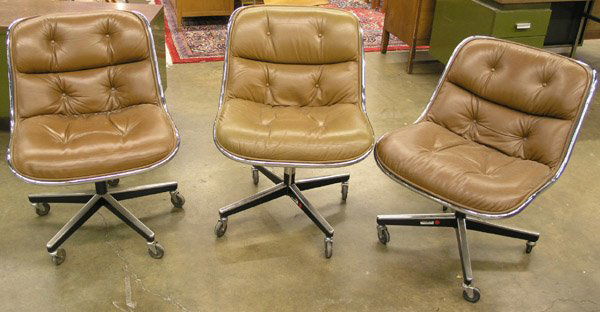 161 Charles Pollock for Knoll Executive Chairs: Charles Pollock executive chairs designed 1965, manufactured by Knoll International, New York, each fiberglass shell with chromed aluminum rim, brown leather upholstery, on aluminum swivel base with c