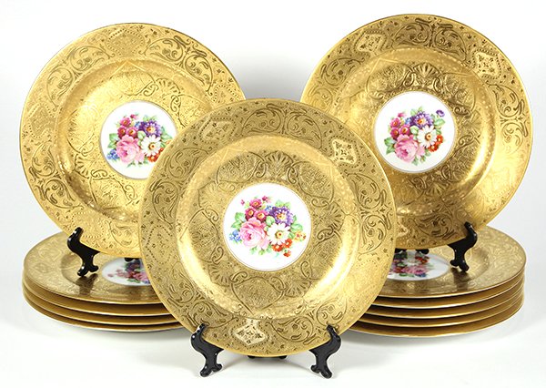 (Lot of 12) Hutschenreuther Royal Bavarian Art Nouveau: (Lot of 12) Hutschenreuther Royal Bavarian Art Nouveau style porcelain cabinet plates, 20th Century, each with a central polychrome floral bouquet surrounded by the elaborate raised gilt border, print
