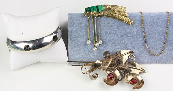 (Lot of 4) Collection of gem, yellow gold and silver: (Lot of 4) Collection of gem, yellow gold and silver jewelry comprised of one modernist malachite, cultured pearl and silver gilt brooch, stamped silver, 1 1/2" x 1"; one Taxco obsidian and sterling s