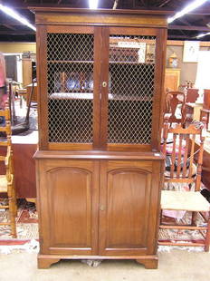 Mahogany library cabinet: Mahogany library cabinet with aviary wire, fitted as entertainment unit
