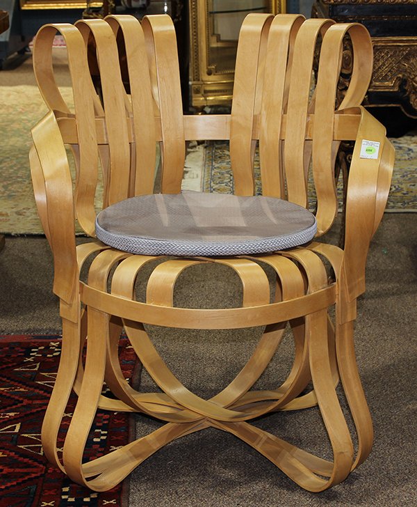 Frank Gehry for Knoll "Crosscheck" bent maple chair: Frank Gehry for Knoll "Crosscheck" bent maple chair, having a shaped frame with a woven seat and white cushion, branded signature to underside, "Gehry Knoll, 04/98, Made in the USA", chair: 32.5"h x 3