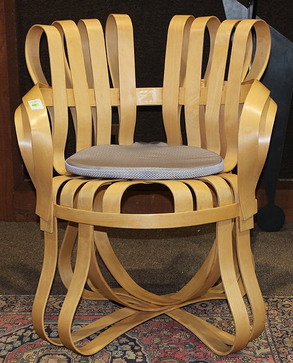 Frank Gehry for Knoll "Crosscheck" bent maple chair: Frank Gehry for Knoll "Crosscheck" bent maple chair, having a shaped frame with a woven seat and white cushion, branded signature to underside, "Gehry Knoll, 04/98, Made in the USA", chair: 32.5"h x 3