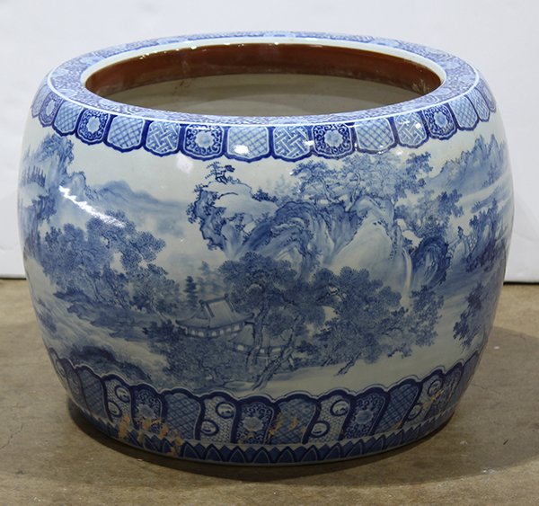 Japanese Large Ceramic Hibachi: Japanese large ceramic circular hibachi, mountains and sea depicted in blue-and-white, approx. 15.75"h x 21"dia. Provenance: Property of Dr. Bernard C. Gerber