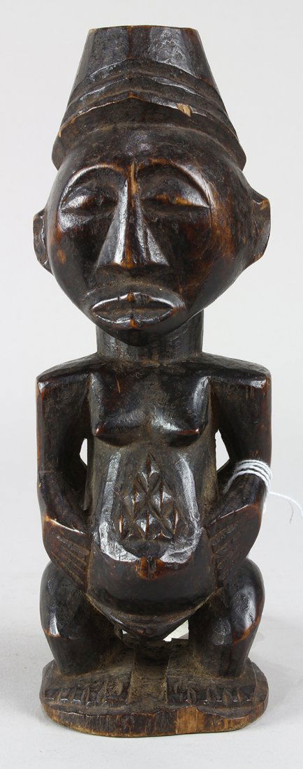 Songye, Congo carved Janus figure depicting standing (1 of 3)