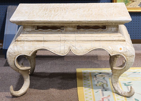 Moderne crackle glaze occasional table executed in the: Moderne crackle glaze occasional table executed in the Asian taste, having a rectangular top, above a pierced apron, and rising on outswept legs, 26"h x 40"w x 24"d
