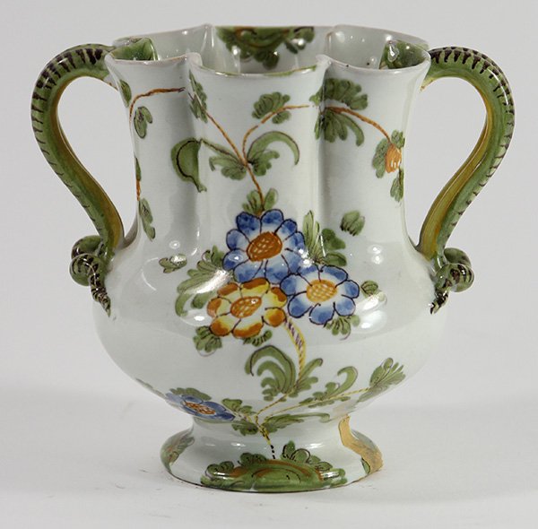 Italian Cantagalli faience vase: Italian Cantagalli faience vase, having a baluster form with a scalloped rim, flanked by naturalistic handles, having hand-painted polychrome floral sprays throughout, base with underglaze rooster mar