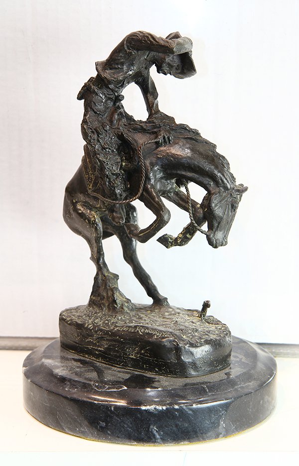 After Frederic Remington, sculpture: After Frederic Sackrider Remington (American, 1861-1909), "The Rattlesnake," bronze sculpture, bears signature lower right, overall (with marble base): 10.25"h x 7"h x 7"w