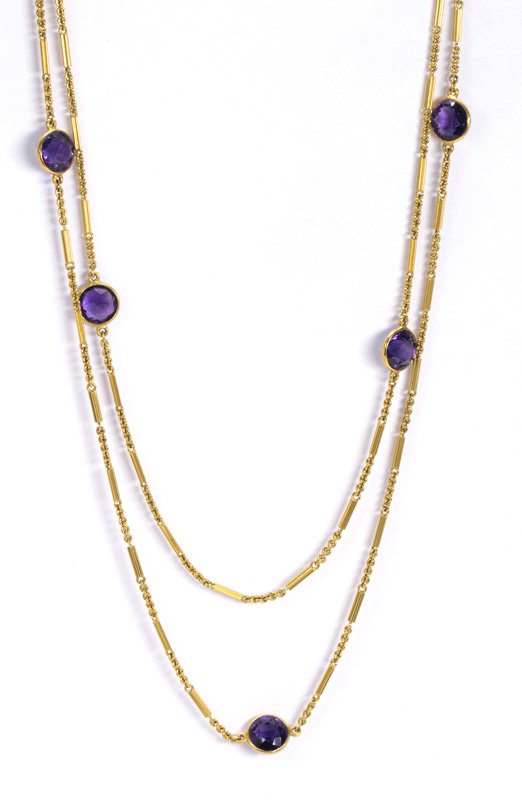 Victorian Amethyst and 14k yellow gold pendant and: Victorian Amethyst and 14k yellow gold pendant and chain featuring (8) round cut amethysts, measuring approximately 7.9 mm, bezel set in a cable and bar link 14k yellow gold swivel, length 54 inches, 