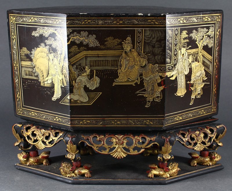 Chinese Gilt Lacquered Carving/Box: Chinese gilt lacquered and carved incense stand with lid, the hexagonal lid decorated with officials, reversed by a landscape reserve; the base inset with gilt wood carved panels featuring flowers and