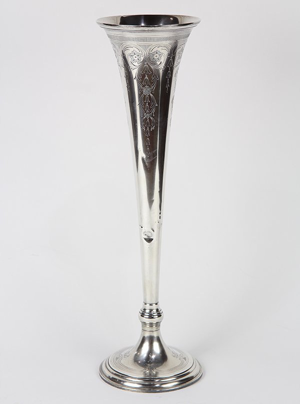 Tiffany & Company sterling silver trumpet vase,: Tiffany & Company sterling silver trumpet vase, 1907-1938, decorated with engraved scrolling acanthus accented by rosettes, and fronted by a stylized monogram, 20"h, 26.52 troy oz.