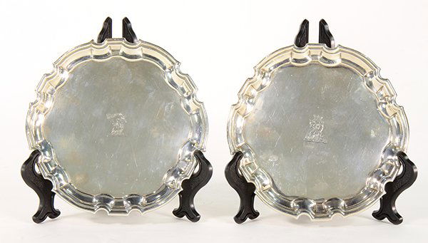 Pair of English George II sterling silver salvers: Pair of English George II sterling silver salvers, bears script initial makers marks JT flanking a chalice, London, 1733, each diminutive form set with a pie crust rim, and having a central engraved b
