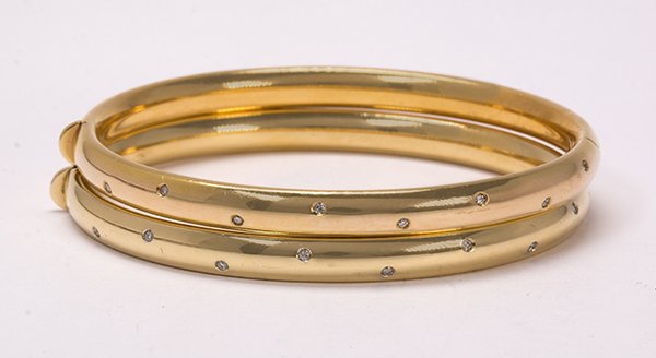 Pair of diamond and 14k yellow gold bangle bracelets (1 of 1)