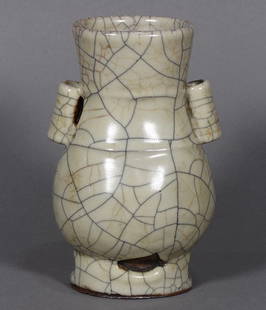 Chinese Ge-type Hu Vase: Chinese Ge-type hu form arrow vase, suffused with a network of dark and gilt crackles, the neck with raised bands flanked by tubular handles, the body raised on a tall foot with apertures, 6.125"h; Pr