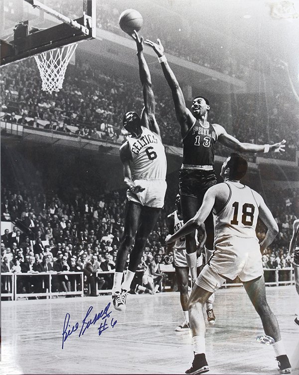 National Basketball Association autographed Bill: National Basketball Association autographed Bill Russell photograph, black and white photograph of Celtics basketball team member Bill Russell, Dick Raphael sports photographer label verso, with holog