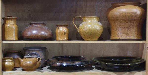 (lot of 11) Two shelves of art pottery (1 of 1)
