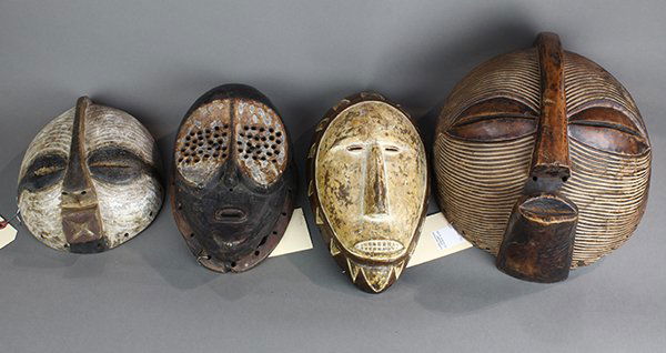 (lot of 4) Luba and Songe, D.R. Congo style decorative: (lot of 4) Luba and Songe, D.R. Congo style decorative carved wood masks, including a Andre Derain style Fang mask, and a Lulua style example, largest: 15"h x 13.25"w. Provenance: Property from the Ro