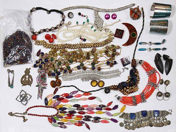 Collection of lapis lazuli, metal and costume jewelry: Collection of lapis lazuli, metal and costume jewelryincluding one lapis lazuli and metal bracelet; two metal cuff bracelets; one metal bead, cord necklace; together with numerous costume necklaces, e