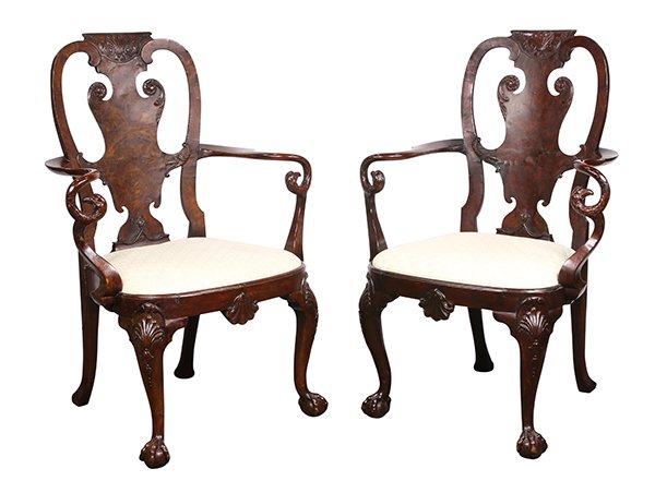 (lot of 2) George III armchairs: (lot of 2) George III armchairs, each having a curved crest surmounting a shaped splat, above carved eagle returns, continuing to a cream upholstered seat, and rising on cabriole legs terminating on c