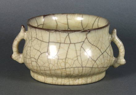 Chinese Guan-type Handled Censer: Chinese Guan-type censer, with a slightly flared rim and a compressed body, flanked by shaped handles, and above a slightly tapering foot, with dark and light crackles on a beige colored ground (damag