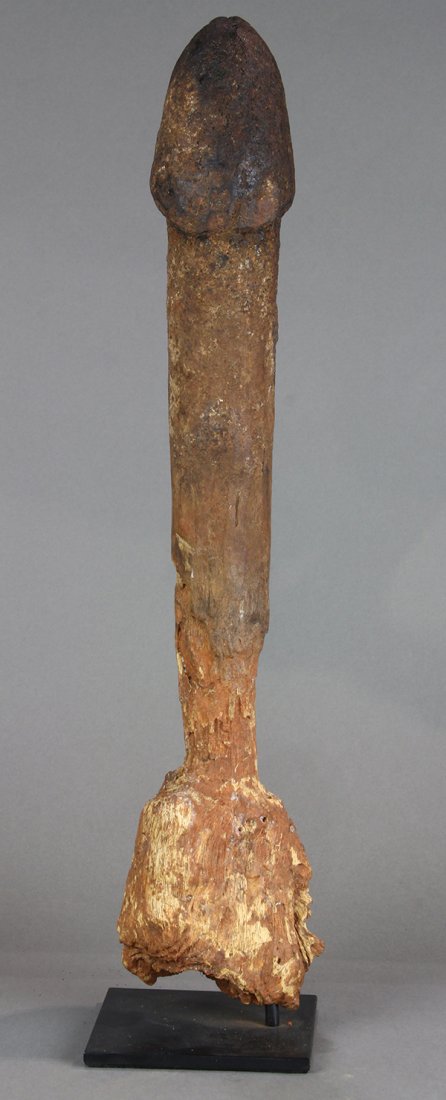Fon people, Togo/Benin, West Africa, the ultimate: Fon people, Togo/Benin, West Africa, the ultimate fertility fetish, phallus-shaped wood, the lower part showing evidence of partial burial in an earthen shrine, the original source of the religion Vou
