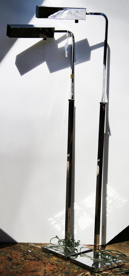 Pair of modern chrome floor lamps, each having a (1 of 1)