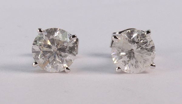 Pair of diamond and 14k white gold stud earrings (1 of 2)