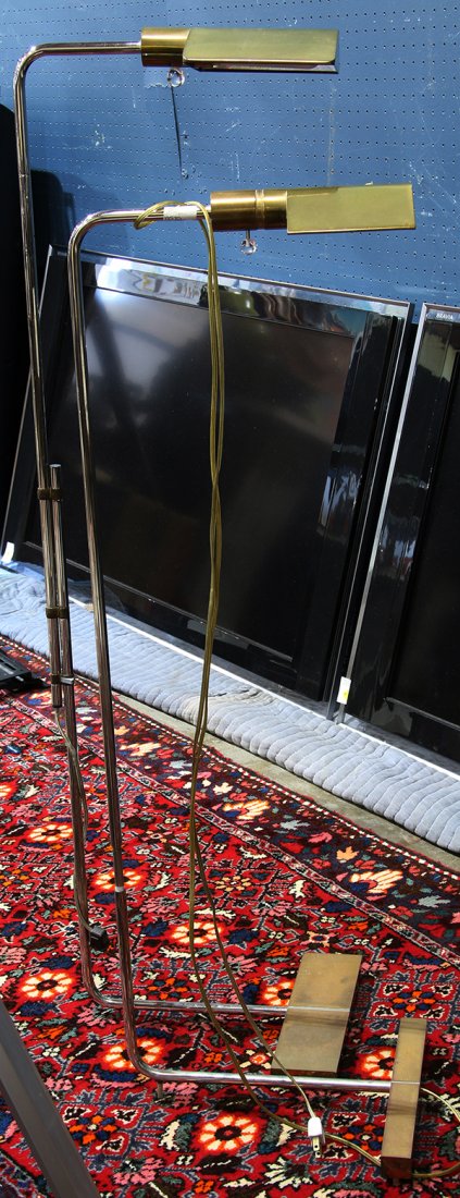 (lot of 2) Brass adjustable floor lamps, each rising on (1 of 1)