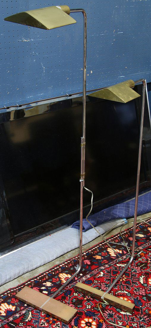 (lot of 2) Brass adjustable floor lamps, each rising on (1 of 1)