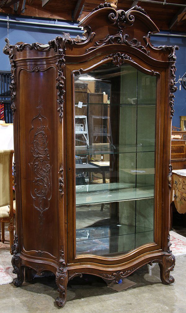 French Rococo style vitrine, having a scroll decorated (1 of 3)
