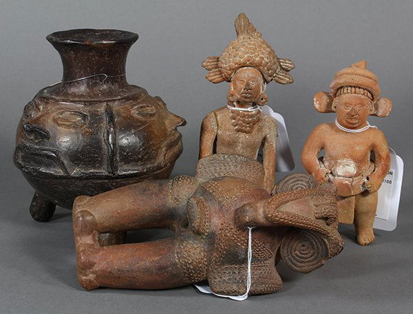 (lot of 4) Pre-Columbian style decorative objects: (lot of 4) Pre-Columbian style decorative objects consisting of two Jaina style ceramic figures, 20th century, made in the Maya region of Mexico; together with a Meso-American style tripod vessel carv