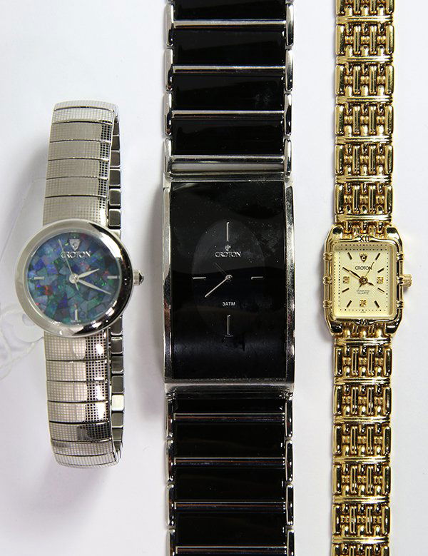 (Lot of 3) Croton Corum metal wristwatches: (Lot of 3) Croton Corum metal wristwatches comprised of one black modern 33 mm wide, metal Croton wristwatch; one opal mosaic dial, stainless steel, 26 mm wide, Croton wristwatch; together with one re