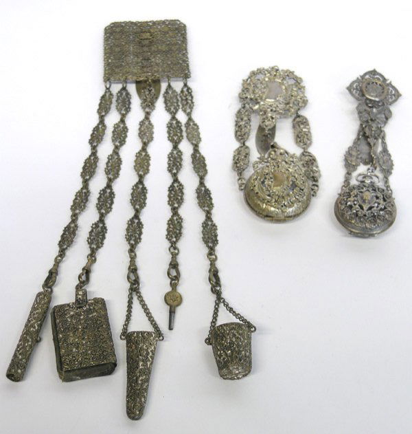 Gilt Metal Filigree Chatelaines: (lot of 3) Gilt metal filigree chatelaine clip holding a sewing kit consisting of five accessory holders for: a pencil holder, pin cushion, scissors case, awl holder, thimble holder.; Gilt metal chate