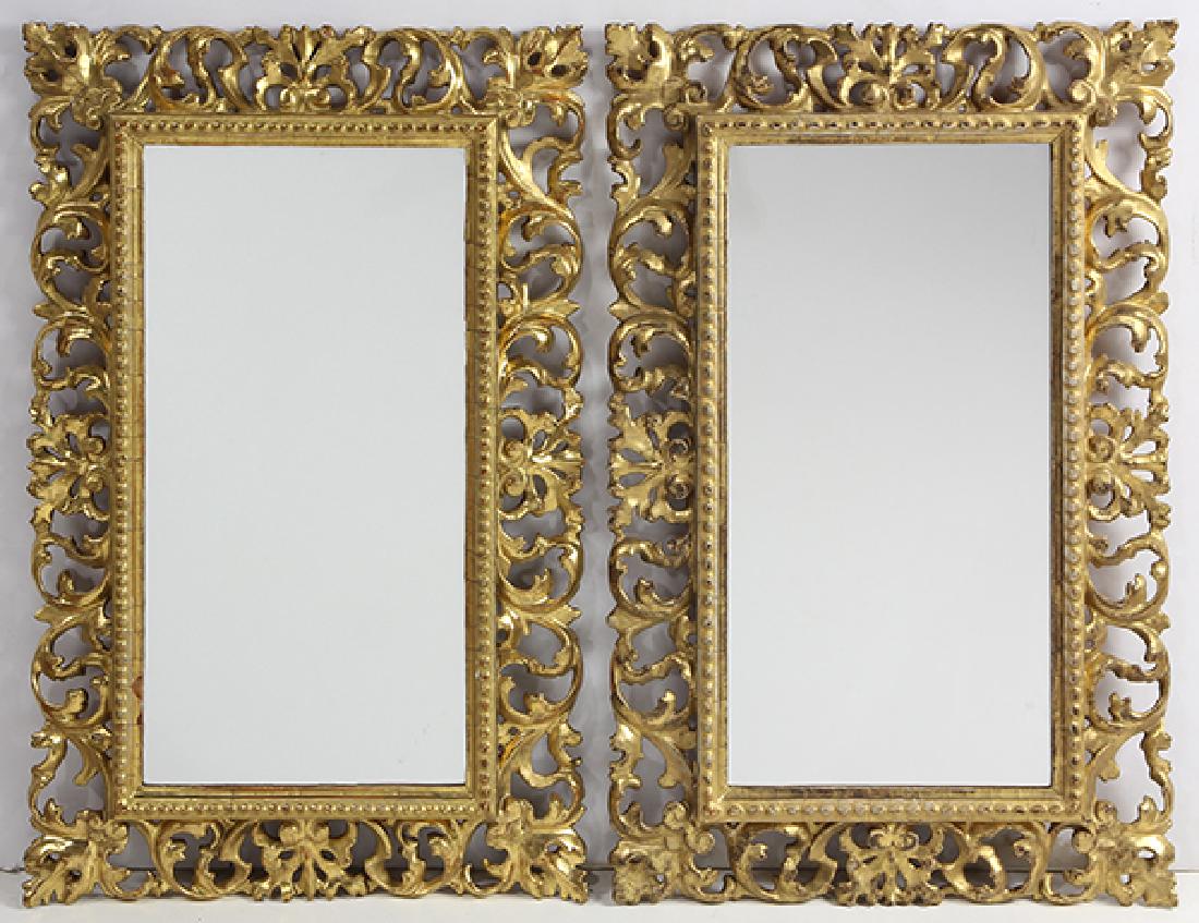 Pair of Continental giltwood carved mirrors, each (1 of 2)