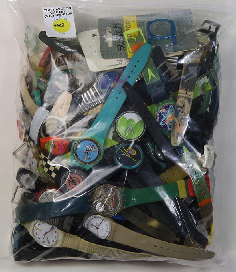 Collection of numerous Swatch and watch parts: Collection of numerous Swatch and watch parts comprised of several Swatch and watch parts and pieces