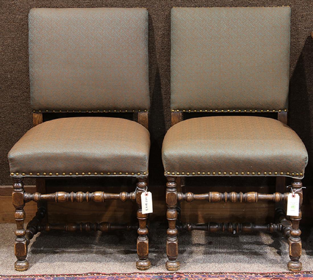Pair of Jacobean style oak hall chairs, French or (1 of 2)