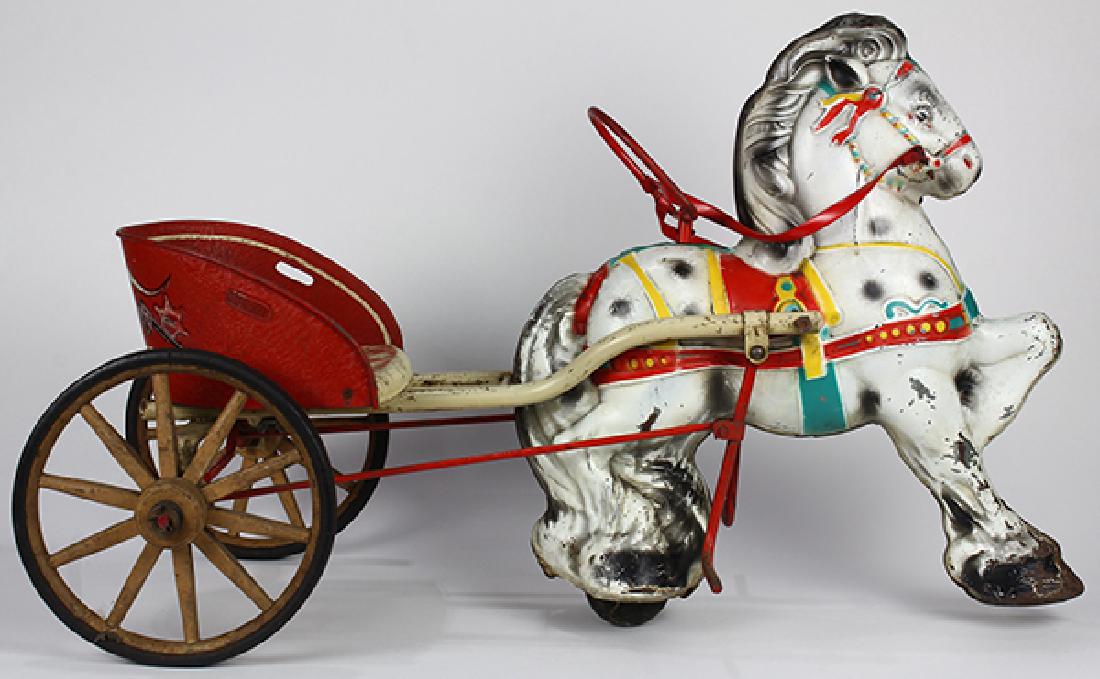 Tole painted tin children's pedal car, circa 1950, as: Tole painted tin children's pedal car, circa 1950, as horse with carriage, 22"h x 16"w x 34"d