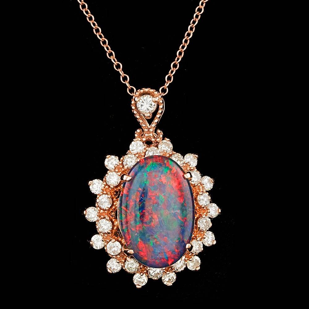 14k Rose Gold 3.50ct Opal 0.90ct Diamond Pendant: Retail: $5,800.00 ****** 14k Rose Gold 3.50ct Opal 0.90ct Diamond Pendant ****** Metal: 14k Solid Rose Gold / Size: 18 / Total Item Weight: 4.5 grams / Country Made: United States / / Main Stone: Opal