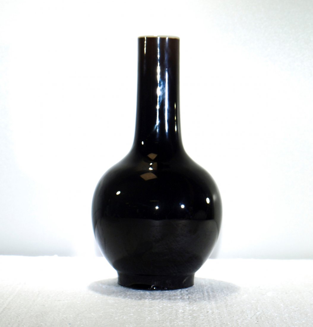 Antique Chinese mirror black porcelain vase: Antique Chinese mirror black porcelain vase--Height 7 5/8 in Width 4 1/8 in. Depth 4 1/8 in. Weight 1 lb 0.4 oz ---