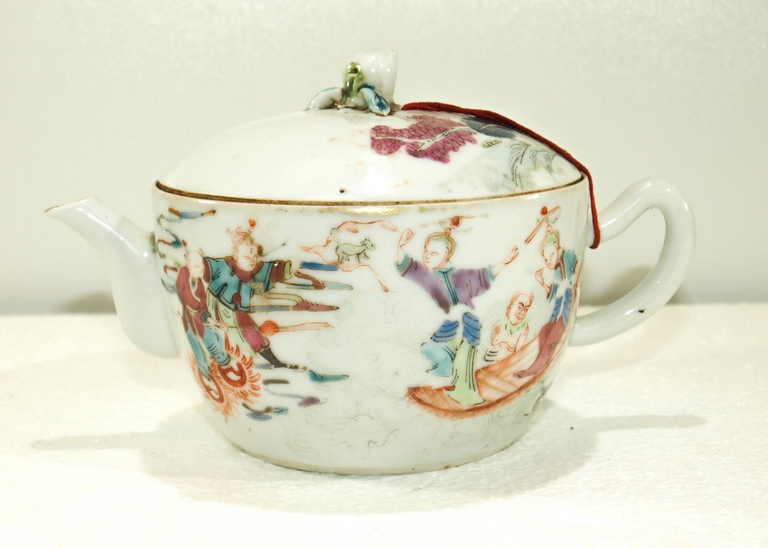 Antique Chinese famille rose immortals porcelain teapot: Antique Chinese famille rose immortals porcelain teapot ---Height P1: 1 1/4 in. Width P1: 3 7/8 in. Depth P1: 7 in. --- Height P2: 2 1/2 in Width P2: 6 1/4 in. Depth P2: 4 1/8 in.--- Lot Weight 9.5 oz