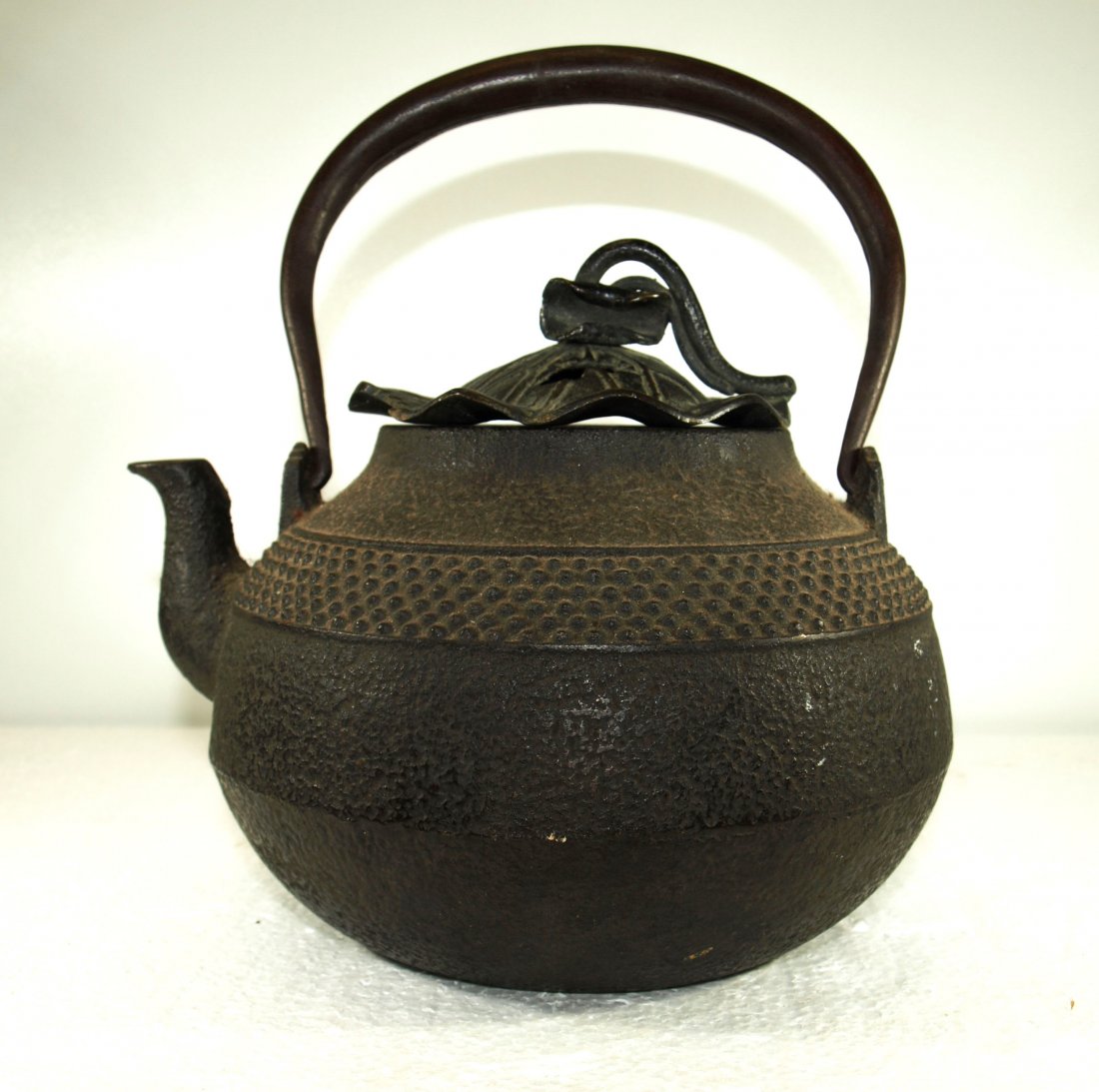 Antique Japanese iron teapot with lotus cover: Antique Japanese iron teapot with lotus cover--- Height 7 7/8 in Width 7 1/8 in Depth 6 1/4 in -- Weight 3.6 lb --