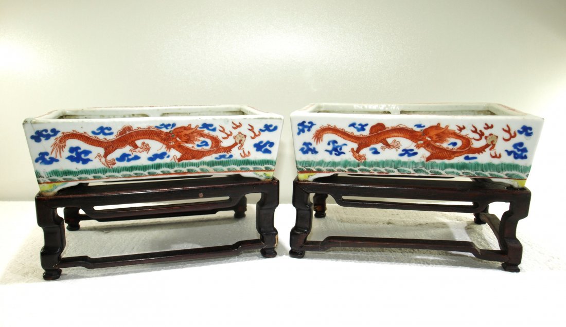 Pr. Antique Chinese porcelain planters on wood stands -: Pr. Antique Chinese porcelain planters on wood stands - dragon design MARK ---Height P1: 2 5/8 in. Width P1: 7 1/2 in. Depth P1: 5 1/4 in. ---Height P2: 2 1/4 in. Width P2: 7 5/8 in. Depth P2: 5 3/8 i