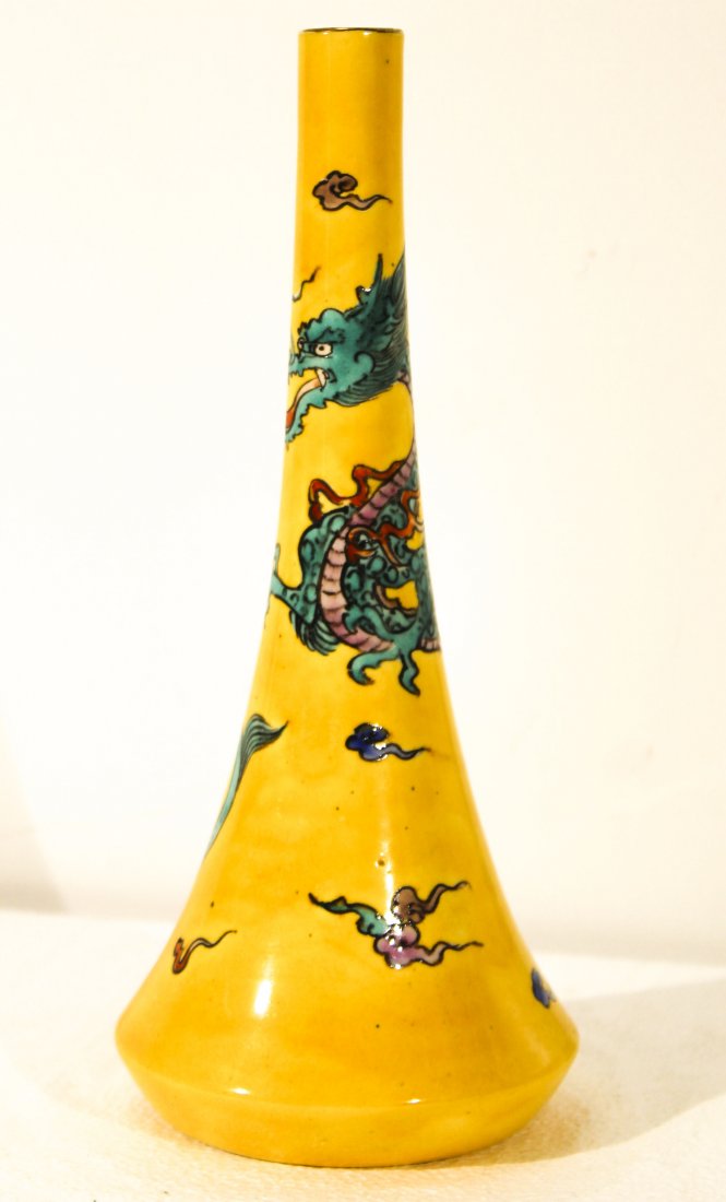 Antique Japanese Kutani and KoKutani porcelain vases: Antique Japanese Kutani and KoKutani porcelain vases***Yellow vase - 9 1/2" height x 4 1/4" diameterWhite vase - 9 1/2" height x 4 1/2" diameter