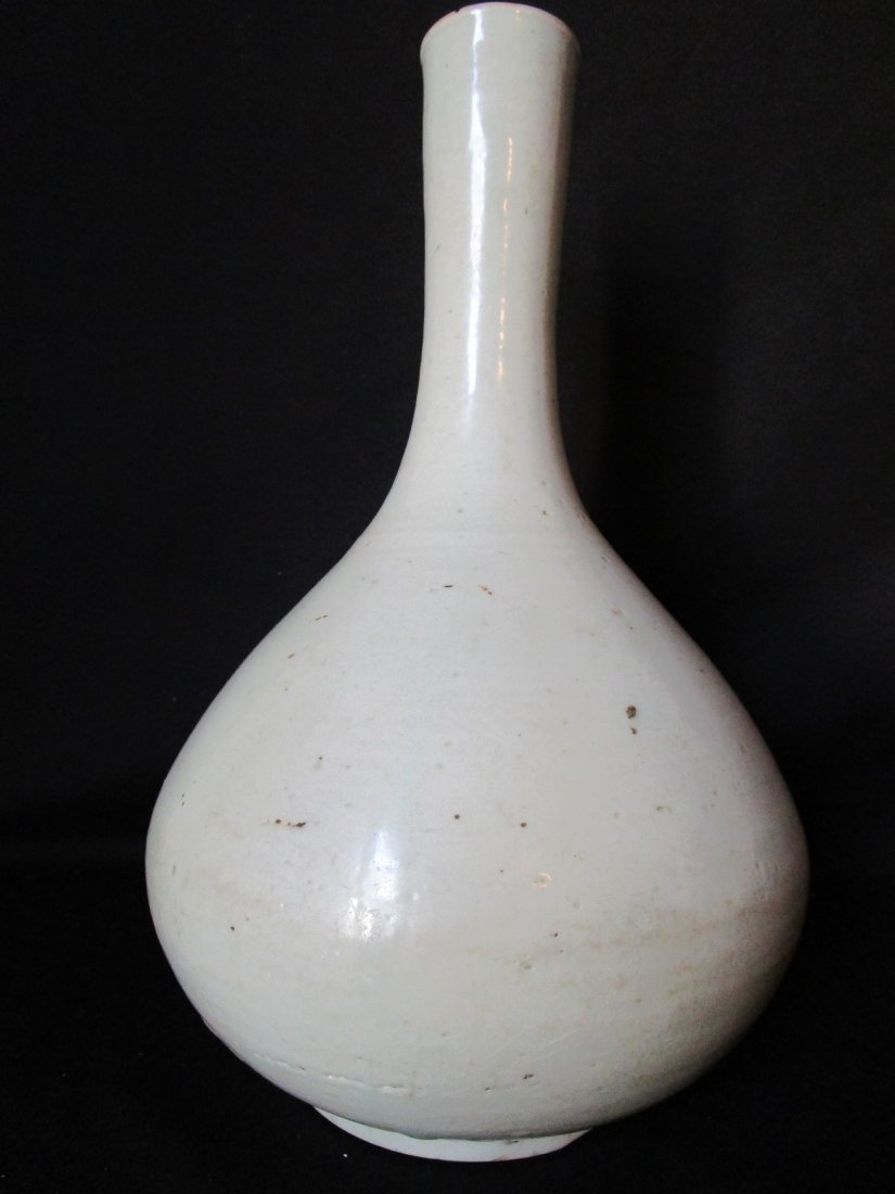 Chinese Ming dynasty celadon porcelain vase: Measures 13" tall x 8" wide. Mouth 2". Foot 4.5"