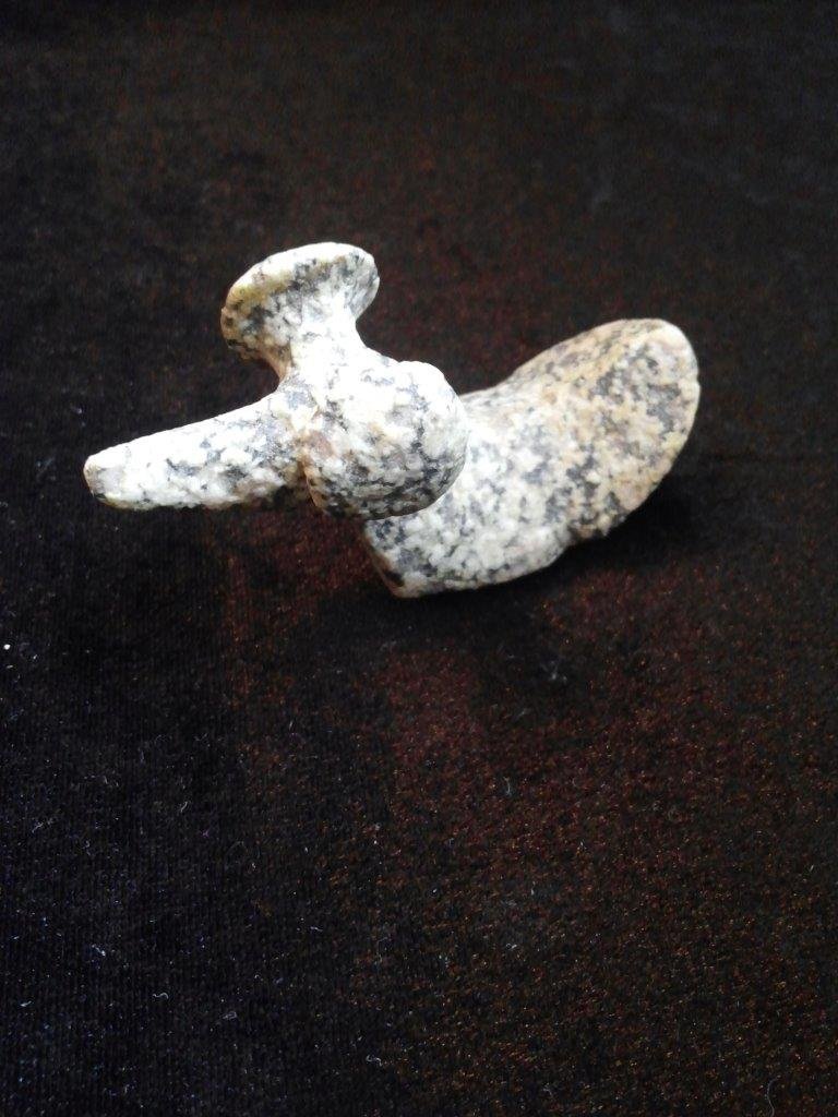 PORPHYRY POPEYED BIRDSTONE: IT IS 2&3/4 INCHES LONG BY 1 INCHES WIDE. IT IS FROM ILLINOIS. IT WOULD MAKE A GREAT ADDITION TO YOUR COLLECTION!
