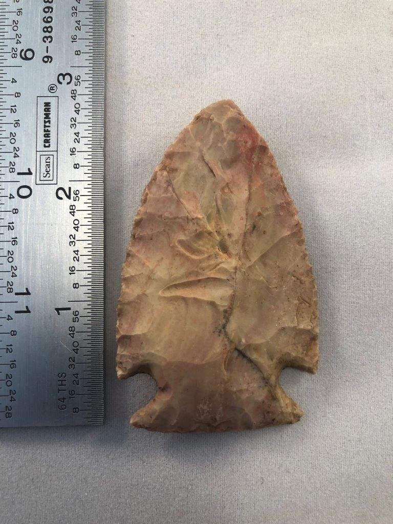 MOTLEY INDIAN ARTIFACT ARROWHEAD: THIS BEAUTIFUL ARTIFACT IS 2&3/4 INCHES LONG. IT COMES FROM MISSOURI. IT WILL MAKE AGREAT ADDITION TO YOUR COLLECTION!