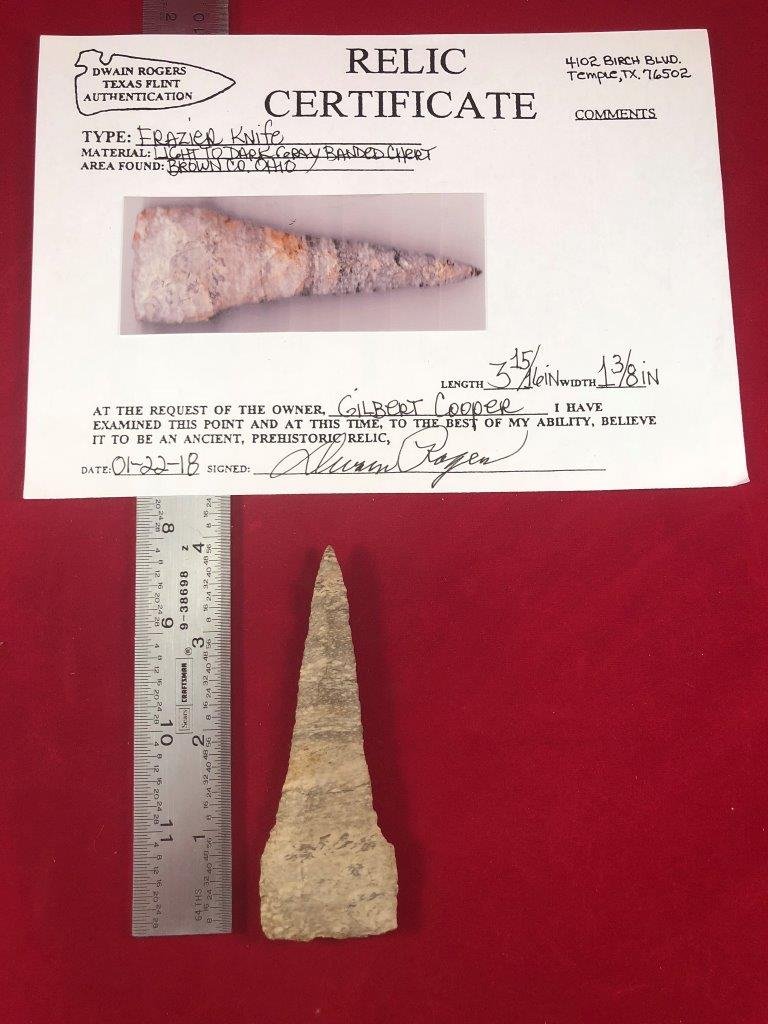 FRAZIER KNIFE INDIAN ARTIFACT ARROWHEAD WITH COA: THIS BEAUTIFUL ARTIFACT IS 3&15/16 INCHES LONG. IT IS FROM BROWN COUNTY OHIO. IT COMES WITH A DWAIN ROGERS CERTIFICATE OF AUTHENTICITY. IT WILL MAKE A GREAT ADDITION TO YOUR COLLECTION!