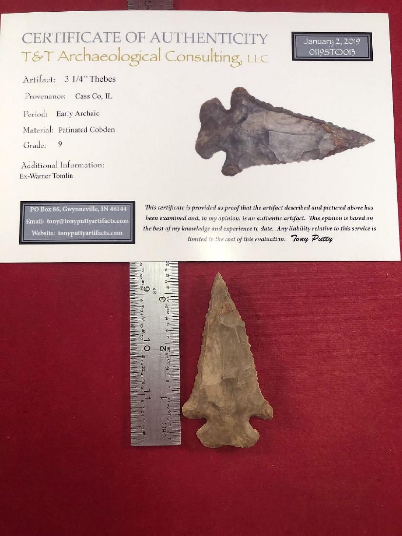 THEBES INDIAN ARTIFACT ARROWHEAD WITH COA: THIS BEAUTIFUL NATIVE AMERICAN INDIAN ARTIFACT IS 3&1/4 INCHES LONG. IT IS FROM CASS COUNTY ILLINOIS. IT COMES WITH A TONY PUTTY CERTIFICATE OF AUTHENTICITY. EX- WARNER TOMLIN COLLECTION. IT WILL MAKE